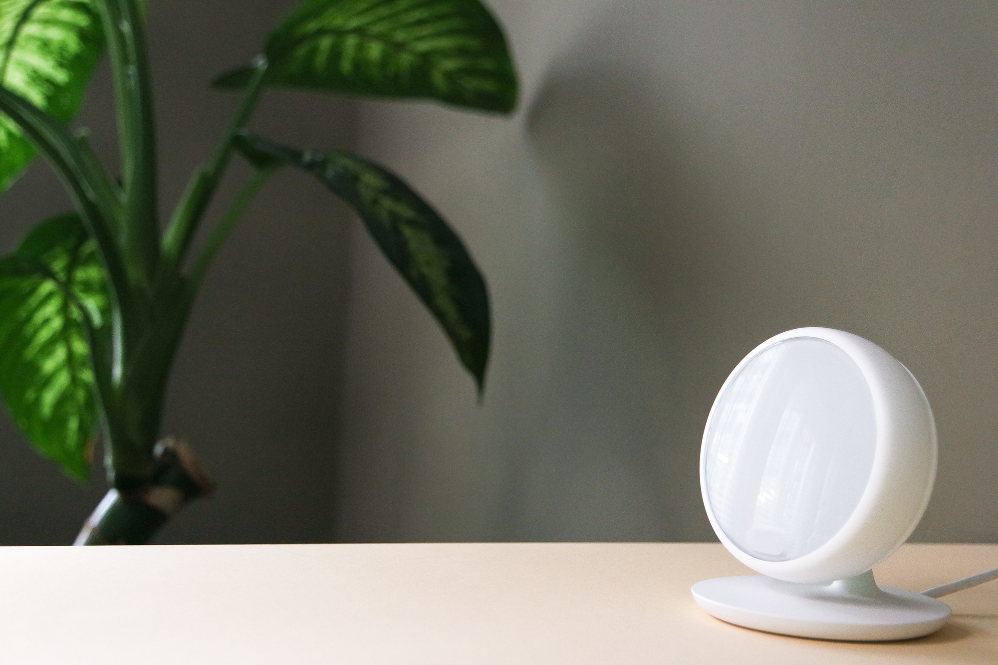 Modern home thermostat operated on mobile phone or tablet. Google controlled devices.